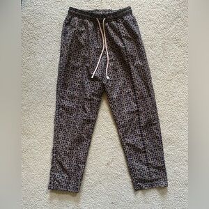 Black Pants with Golden Symbols